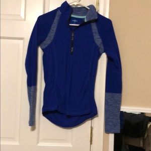 dark blue and light blue pull over
